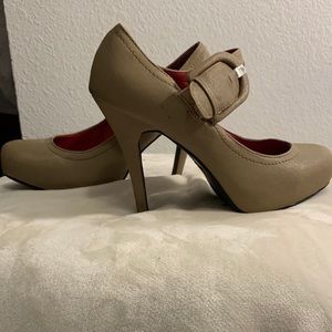 Tan leather high heels.